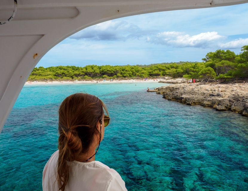 Menorca: Full-Day Boat Tour with Paella Lunch - Son Saura brings another kind of beach stop