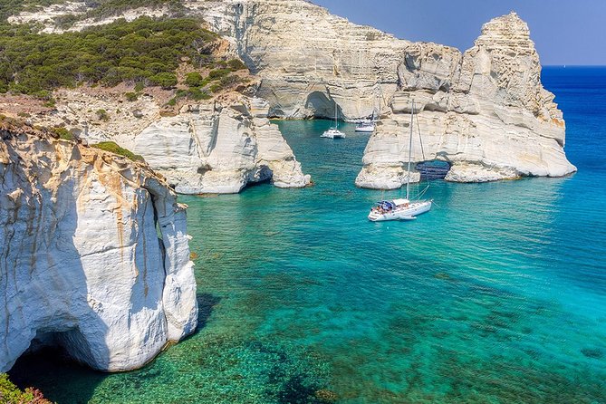 Milos Small-Group Full-Day Cruise with Snorkelling and Lunch - Leaving Adamas and passing Milos’s old industrial coast