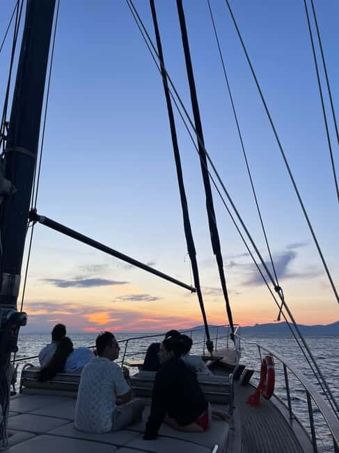 Mykonos: Sunset Boat Cruise with Light Dinner & Drinks - Boarding at Agios Ioannis Diakoftis