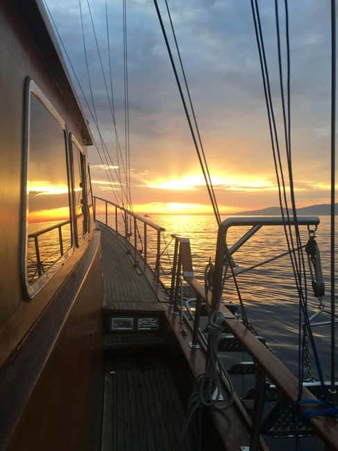 Mykonos: Sunset Boat Cruise with Light Dinner & Drinks - Dinner onboard is better than the word light suggests