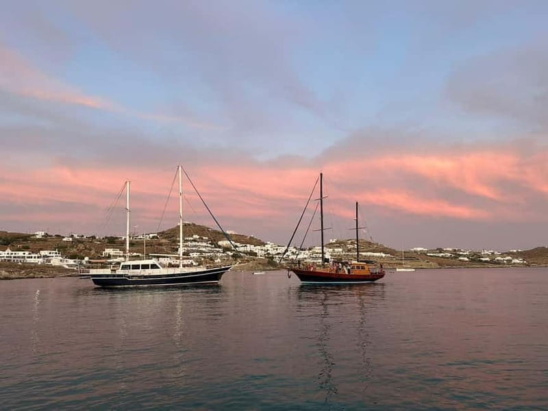 Mykonos: Sunset Boat Cruise with Light Dinner & Drinks - Group size, weather, and practical comfort