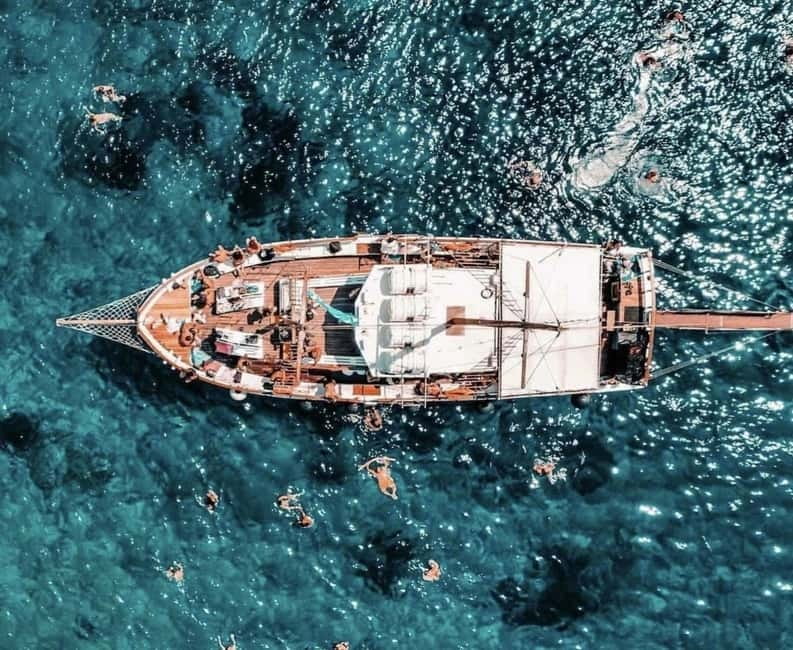 Naxos: Rina Cave-Koufonisi Cruise & Rina Cave Swim with BBQ - A Greek barbecue with local wine