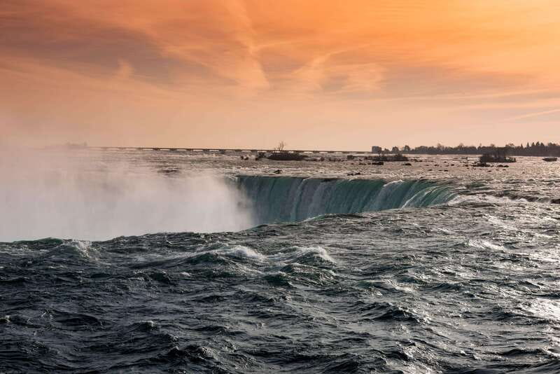 Niagara Falls Day Tour with Boat Ride & Journey Behind Falls - What the guide adds to the day