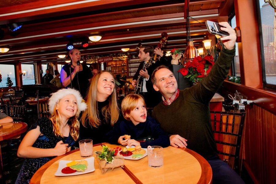 NYC: Holiday Yacht Cruise with Jazz, Cocoa & Carols - A warm holiday cabin with cocoa and cookies