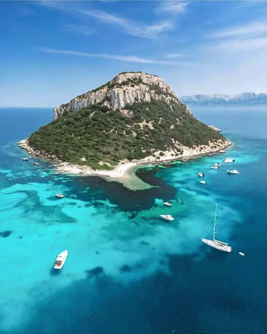 Olbia: Dolphin Watching & Snorkeling Boat Tour near Figarolo - Boca Island, the cliffs, and the final cruise