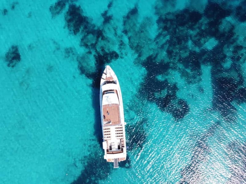 Palau: La Maddalena Archipelago Boat Tour with 4 Stops - La Maddalena town after the swimming stops