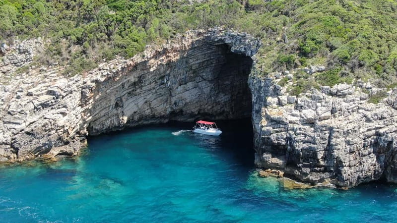 Paleokastritsa: Paradise, Yali Beach & Blue Caves Boat Tour - Paradise Beach, or Chomi, from the boat