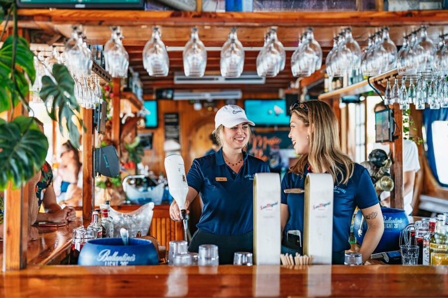 Palma de Mallorca: Daytime Cruise with Swim Stop - The bar, dance floor, and daytime party mood