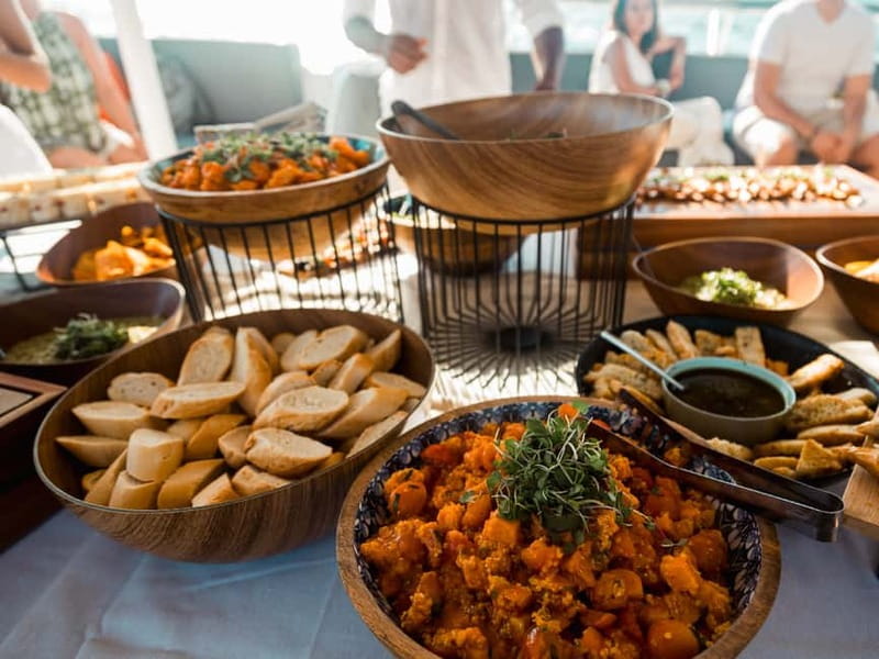 Palma de Mallorca: Half-Day Catamaran Tour with Buffet Meal - Drinks, music, and the onboard mood
