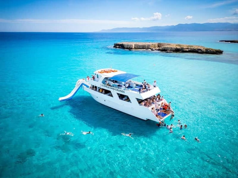 Paphos/Akamas: Blue Lagoon Bus & Boat Tour with Water Slide - Edro III, sea caves, and the banana plantations