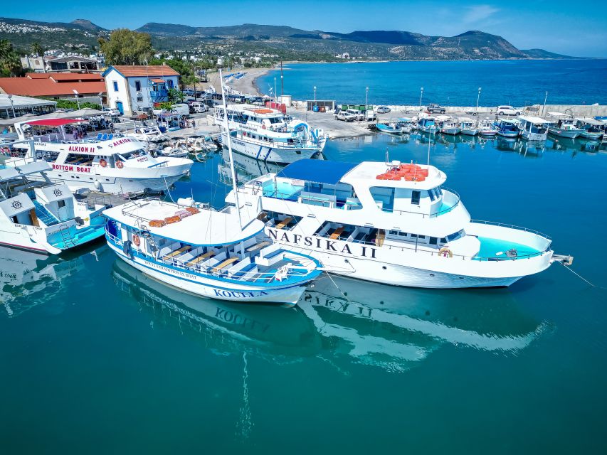 Paphos/Akamas: Blue Lagoon Bus & Boat Tour with Water Slide - Reaching Latchi and boarding the boat