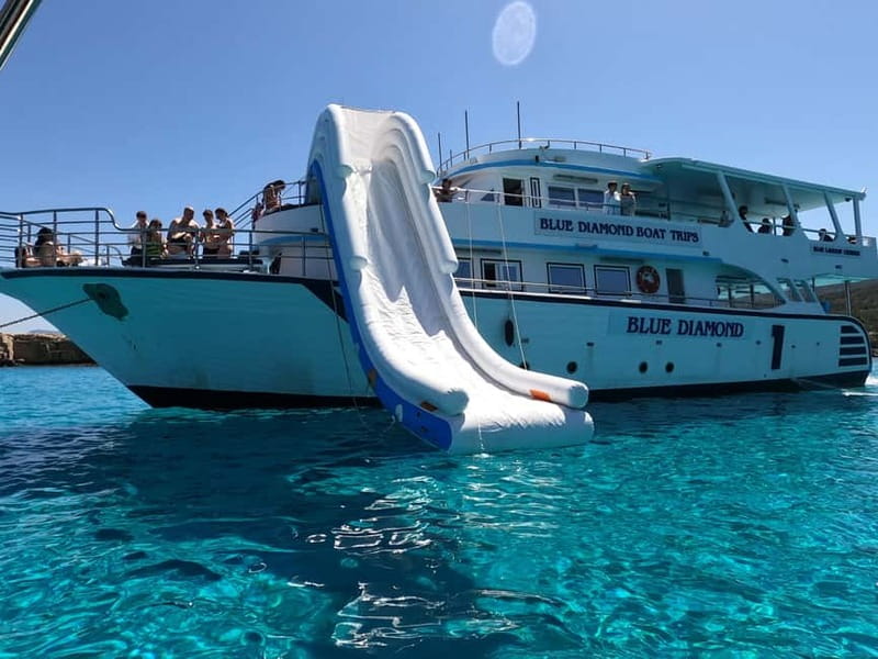 Paphos Blue Lagoon Cruise: Slide, Music & Hotel Transfer - Food, drinks, and the onboard bar