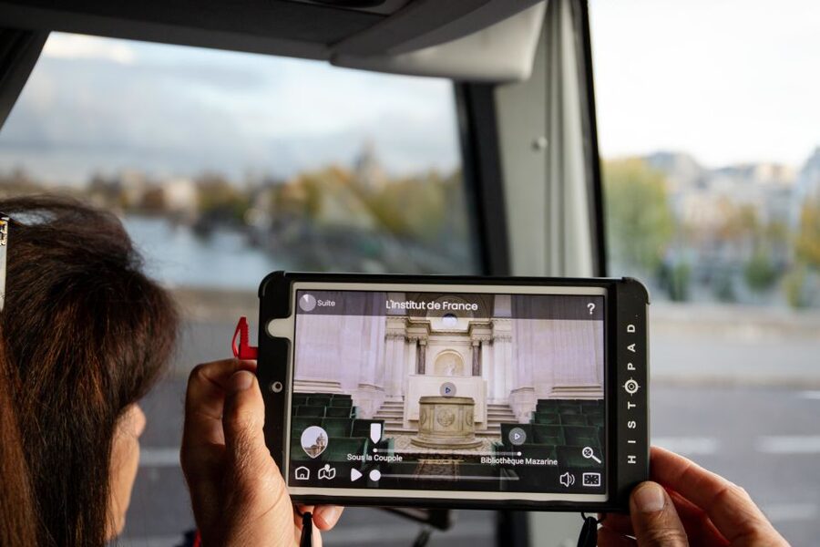 Paris: Audio-Guided Bus Tour & Seine River Cruise - Boarding the glass-sided Seine trimaran