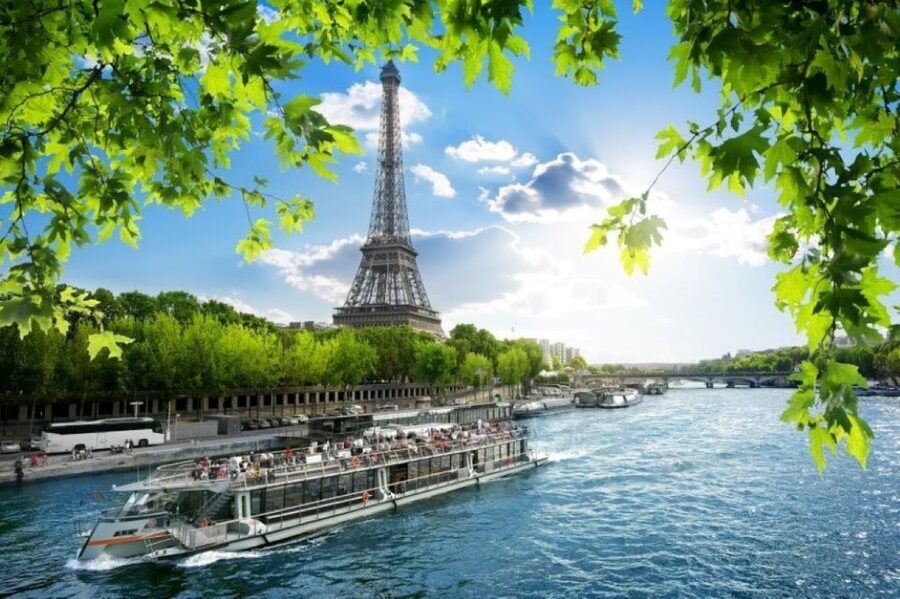 Paris: Eiffel Tower Summit Floor Ticket & Seine River Cruise - Entering the Eiffel Tower with a short introduction