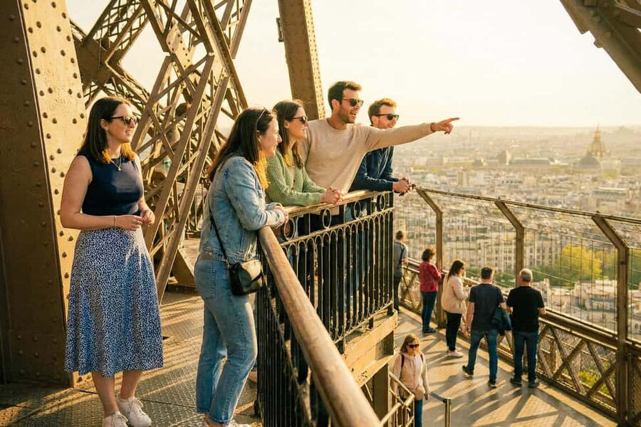Paris: Seine River Cruise & Eiffel Tower Visit - Meeting your Crown Tours host by the Eiffel Tower