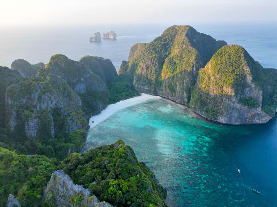 Phi Phi: Private Longtail Boat to Maya Bay with Snorkeling - Sunset and bioluminescent plankton after dark