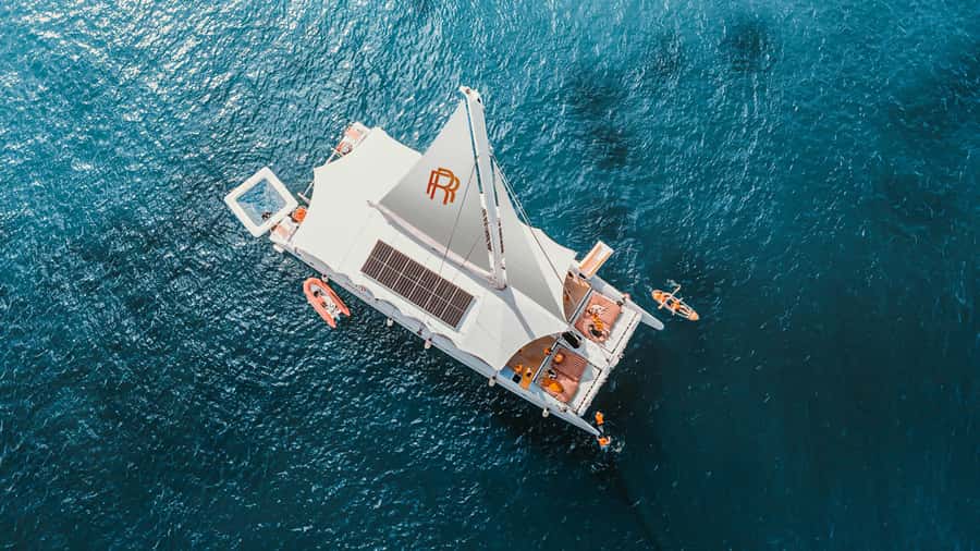 Phuket: Coral and Racha lslands Catamaran Tour with Lunch - From hotel pickup to Phuket Deep Sea Port