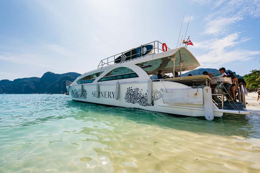 Phuket: Phi Phi Islands Day-Trip by Speed Catamaran - Phi Phi Don combines lunch with local activity