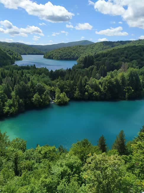 Plitvice Lakes: Guided Walking Tour with Bus and Boat Ride - The Panoramic Train Back to Entrance 1