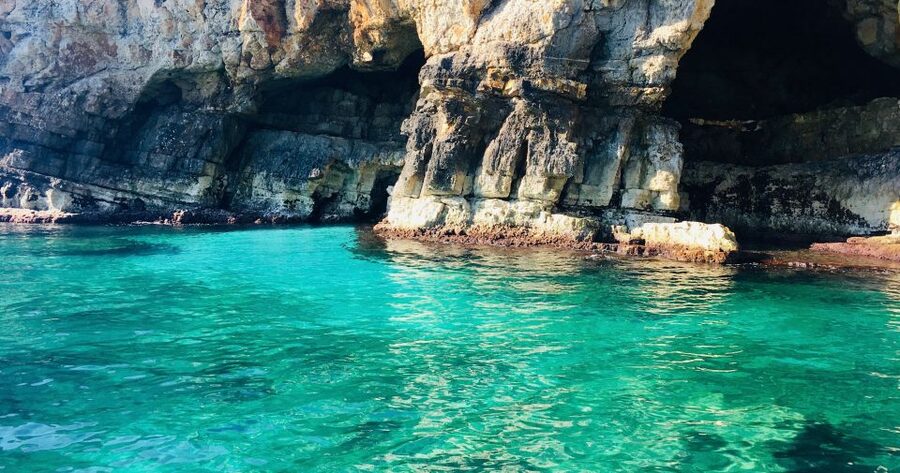 Polignano a Mare: Boat Trip, Swim & Cave with Aperitif - Grotta Palazzese and the famous cliffside restaurant