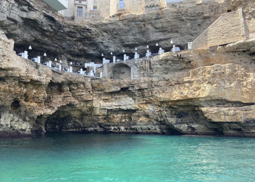 Polignano's coast and caves: a boat tour with drinks, swimming, music, and fun - The monastery and the first coastal views
