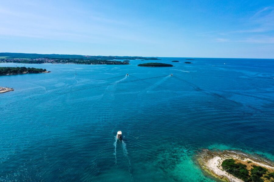 Poreč: Panoramic Morning Cruise Among 20 Islands with Drinks - Crew, drinks, and the mood on board