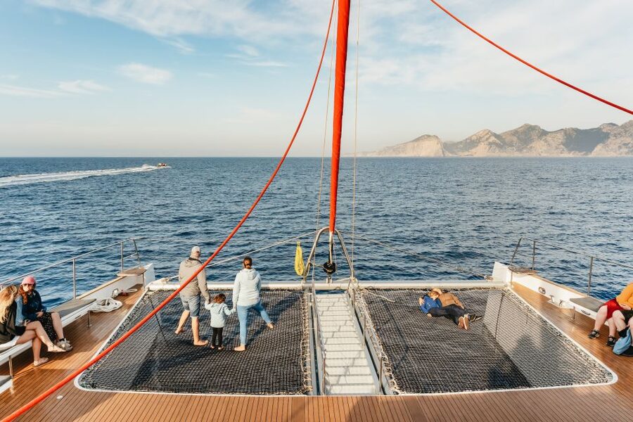 Port d'Alcudia: Sunrise at Sea & Dolphin Watching Boat Tour - The return cruise and coastal views