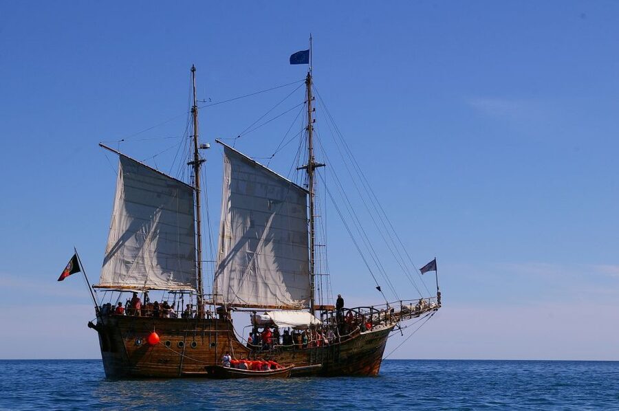 Portimão: Pirate Ship Cave Cruise - The ride home, dolphins, and sunset light
