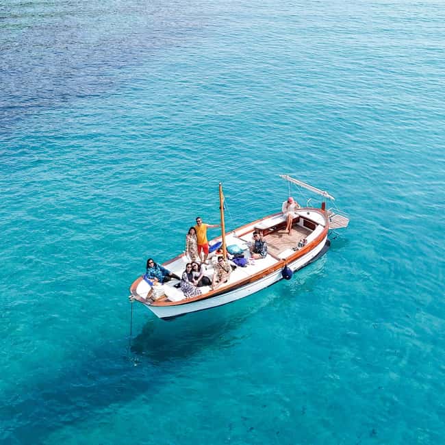 Porto San Paolo: Half Day Boat Tour to Tavolara and Molara - Tavolara’s cliffs, caves, and famous profile