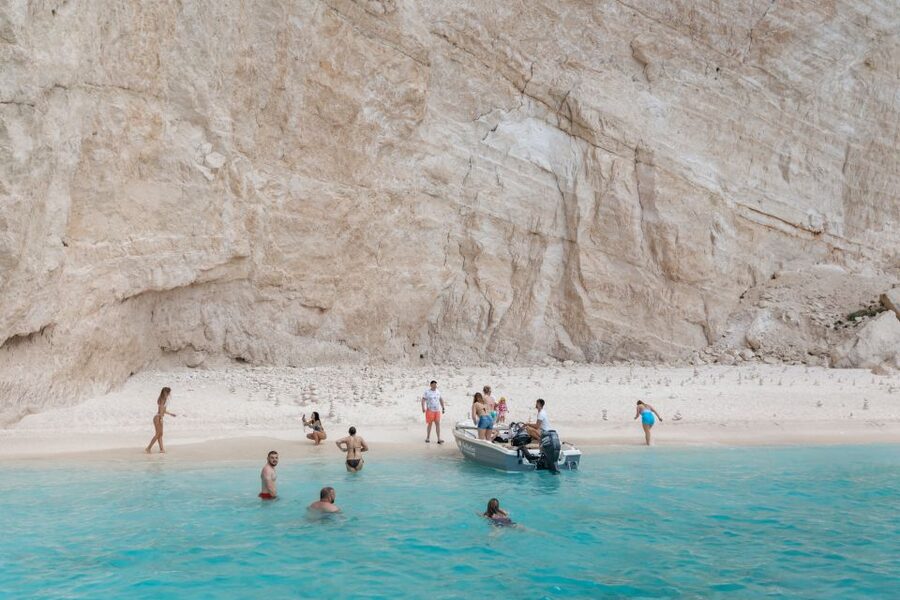 Porto Vromi: Shipwreck, Caves, & White Beach Swimming Cruise - Leaving Porto Vromi Maries for the western coast