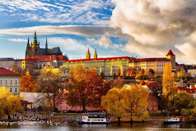 Prague Guided Walking Tour and Cruise with Authentic Czech Lunch - A wooden boat on the Vltava