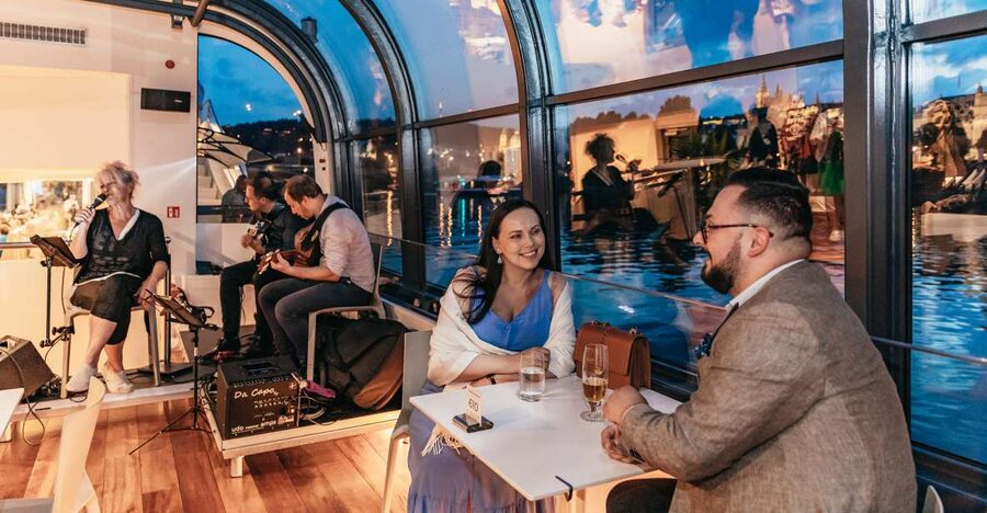Prague: Sightseeing Dinner Cruise on Open-Top Glass Boat - Live music creates the evening’s mood