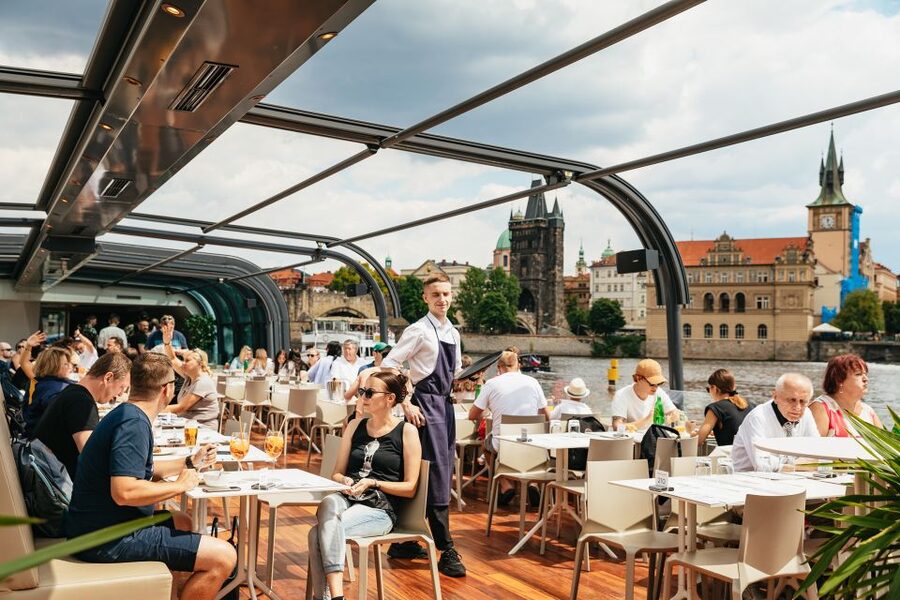 Prague: Vltava River Lunch Cruise in an Open-Top Glass Boat - Charles Bridge from below