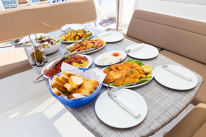 Premium Small-Group Catamaran Cruise with BBQ, Open Bar, Transfer - Day sailing or sunset sailing?