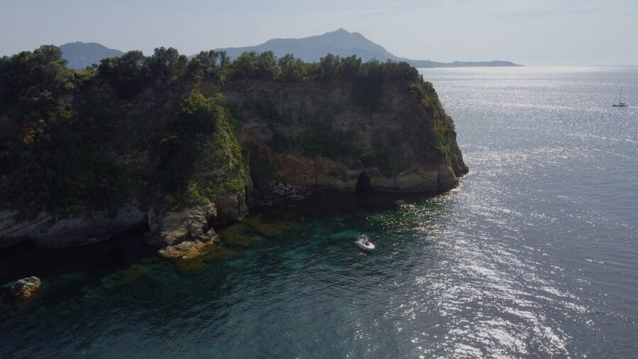 Procida: Boat Tour with Swimming Stops and Underwater Photos - Passing Cala del Pozzo Vecchio and Postman’s Beach