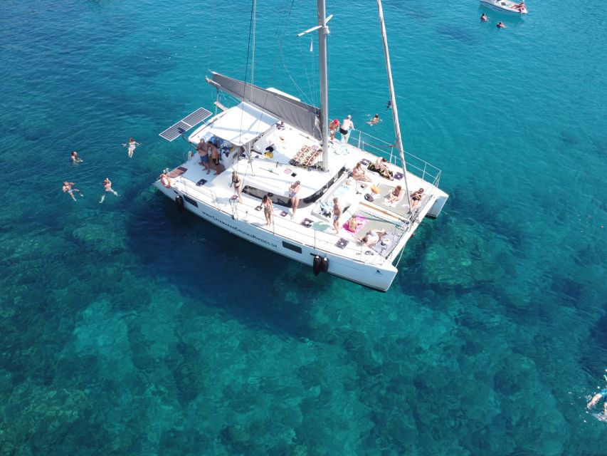 Rhodes: All-Inclusive Catamaran Cruise with Lunch and Drinks - Lunch at sea, with Greek flavors and cold drinks