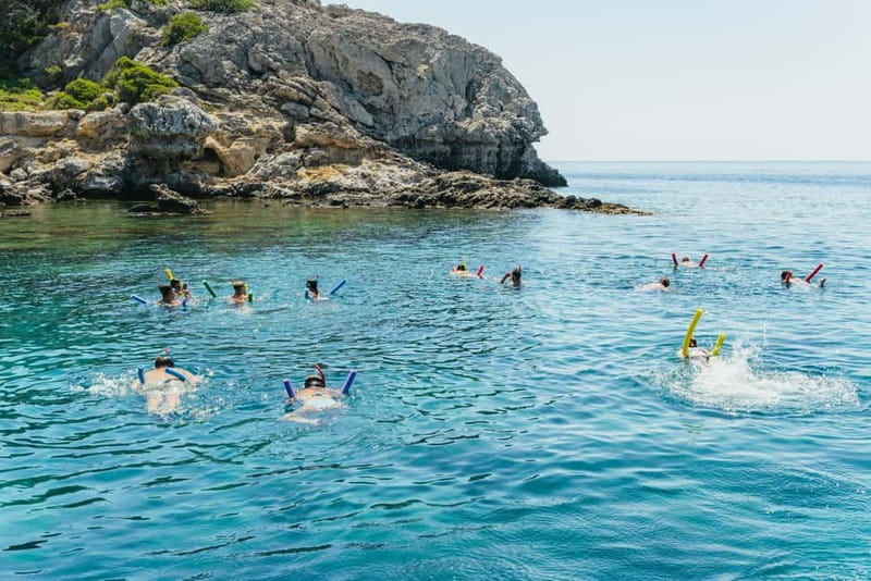 Rhodes: Anthony Quinn, Ladiko and Caves All-Inclusive Cruise - Traganou Caves: swim into the rock