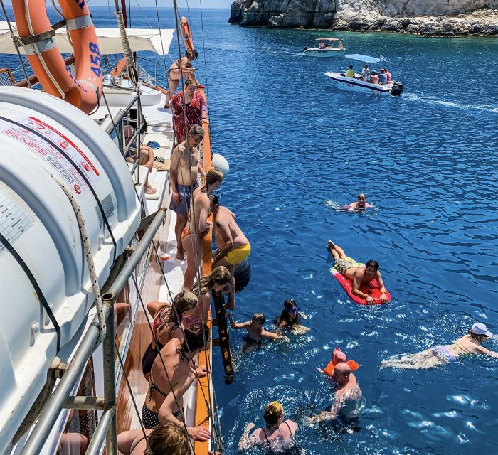 Rhodes: Cruise with 3 Stops, Lunch and Unlimited Drinks - Sun, seating, and sea conditions