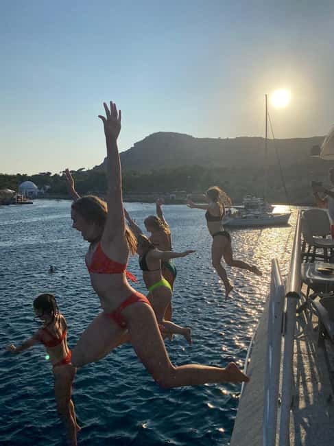 Rhodes: Sunset Cruise with Open Bar, Dinner, & Live Music - Key points to know before booking