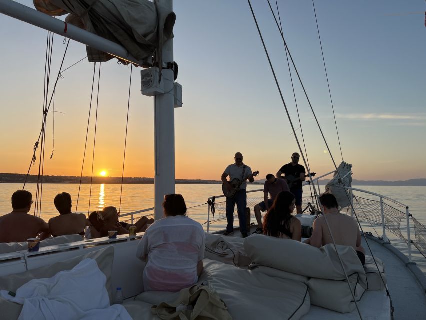 Rhodes: Sunset Cruise with Open Bar, Dinner, & Live Music - Sunset, moonrise, and live music