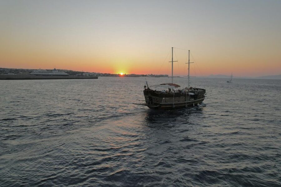 Rhodes: Sunset Cruise with Unlimited Aperol, Beer, and Wine - Leaving Mandraki Harbour as Rhodes Cools Down