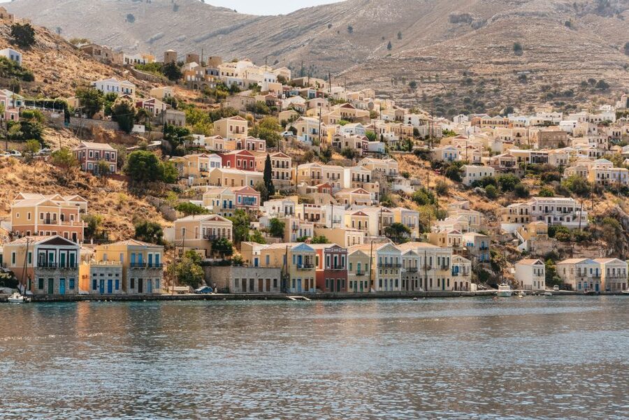 Rhodes: Symi Island & Panormitis Monastery Day Trip by Boat - The scenic coast between Panormitis and Symi Town