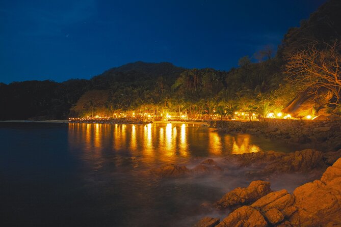 Rhythms of the night, Sunset Cruise, Candlelit Dinner & Alma Show - Candlelit dinner, open bar, and a busy dining setup