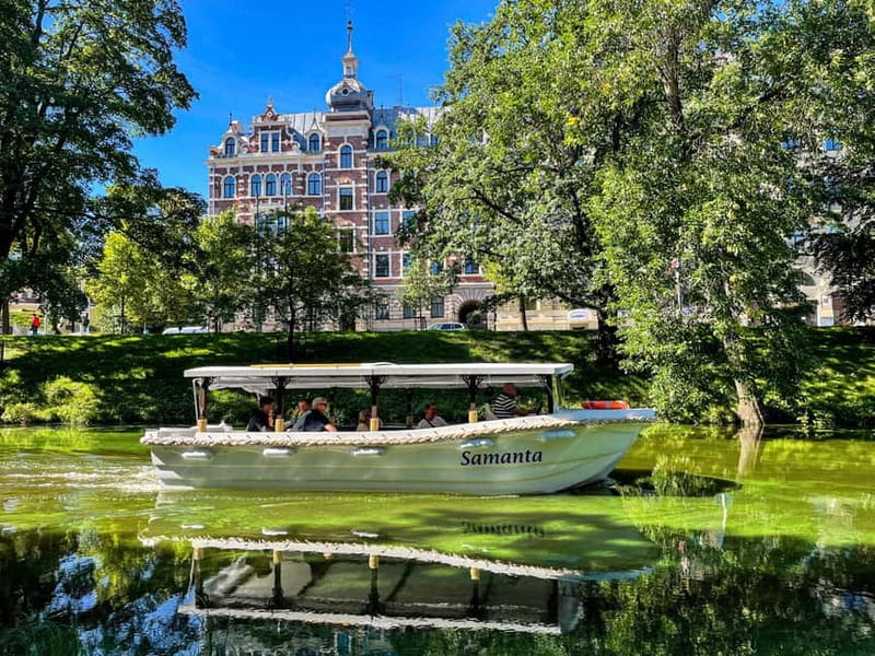 Riga: Canal Boat Sightseeing Tour With Audio guide - Central Market, the railway bridges, and the Daugava