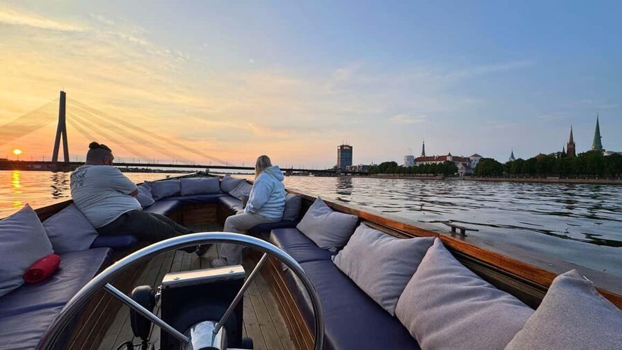 Riga: Canal Boat Tour with Welcome Drink & Audio Guide - Riga Central Market beside the canal