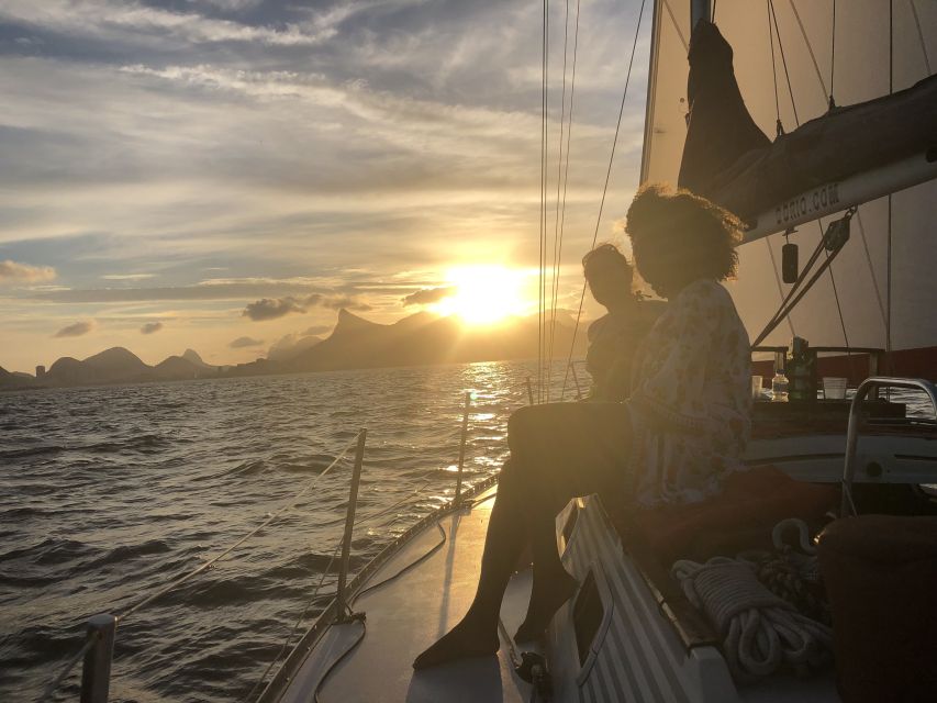 Rio de Janeiro: Sunset Sailing Tour - The sunset, photo stops, and possible swim