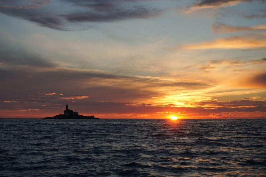 Rovinj: Sunset Boat Trip with Dolphin Watching - The first views of Rovinj Island