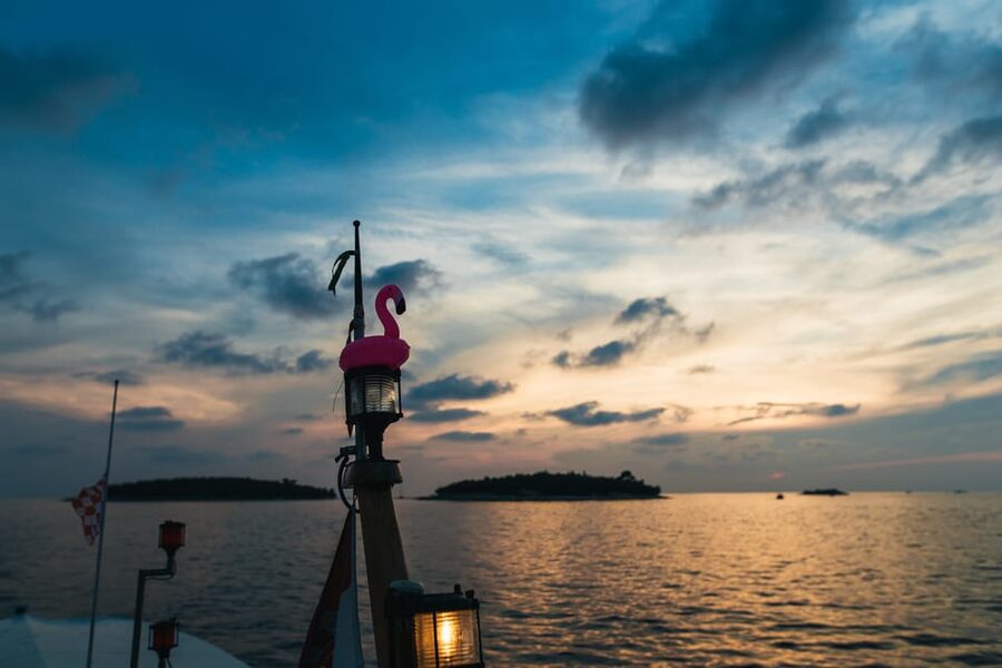 Rovinj: Sunset Cruise with Swim Stop, Drinks, and Fruits - Leaving Villas Rubin for the Rovinj coast