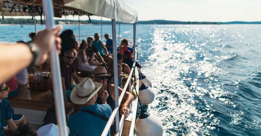 Rovinj: Sunset Cruise with Swim Stop, Drinks, and Fruits - The swim stop: the most active part of the outing