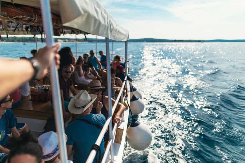 Rovinj: Sunset Cruise with Swim Stop, Drinks, and Fruits - What the Stupica boat experience feels like